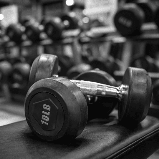 With personalized training programs, a strength coach focuses on building strength, improving endurance, and enhancing overall fitness.